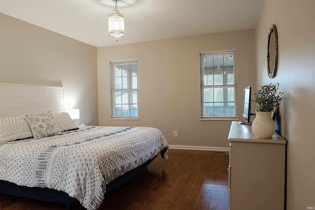 bedroom featuring dark hardwood / wood-style floors