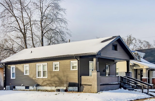 exterior space featuring central AC unit and a porch