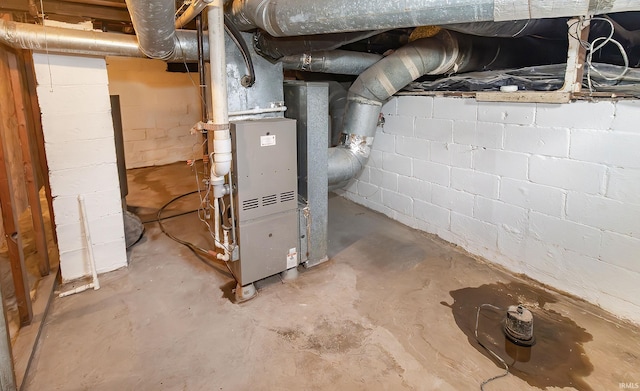 utility room with heating unit