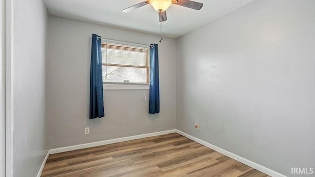 unfurnished room featuring ceiling fan and light hardwood / wood-style floors