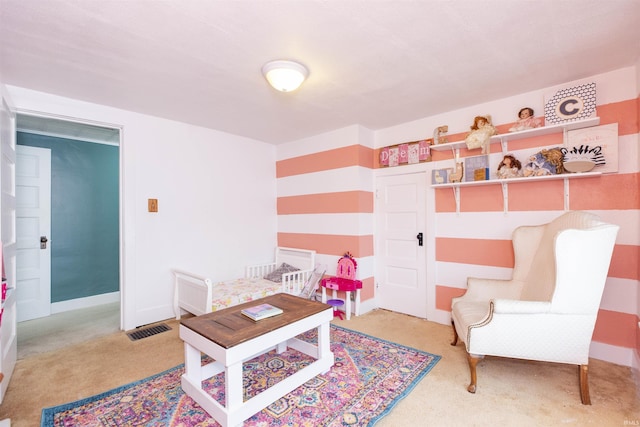 living area with light colored carpet