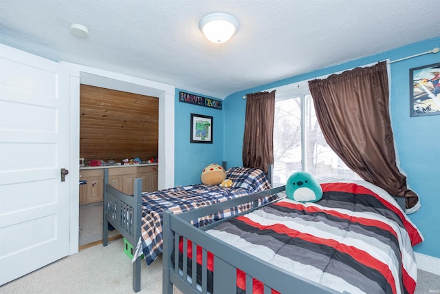 bedroom featuring a textured ceiling