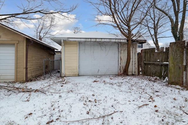 view of snow covered garage