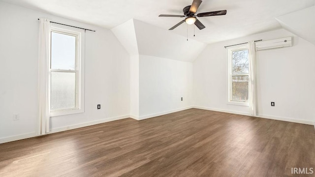 bonus room with ceiling fan, lofted ceiling, a wealth of natural light, and a wall mounted AC