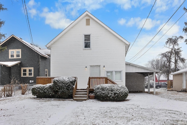 view of snow covered house