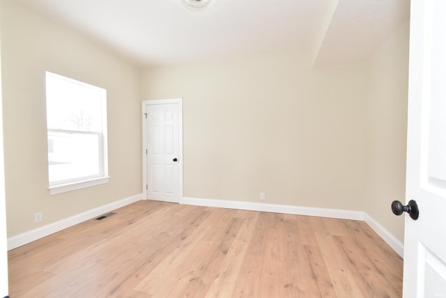 unfurnished room featuring light hardwood / wood-style flooring