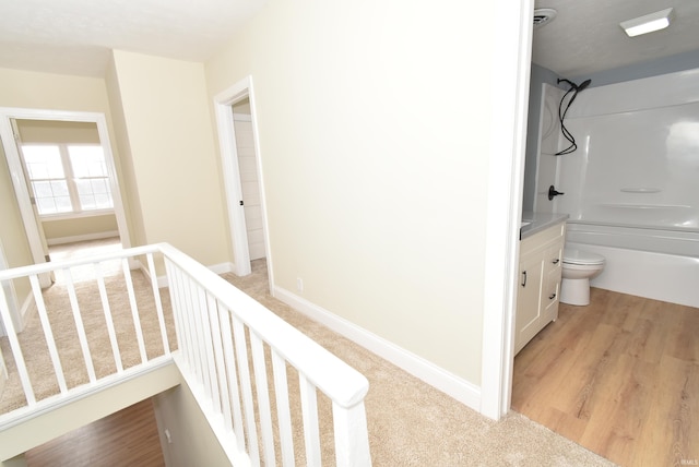 hallway featuring light hardwood / wood-style flooring