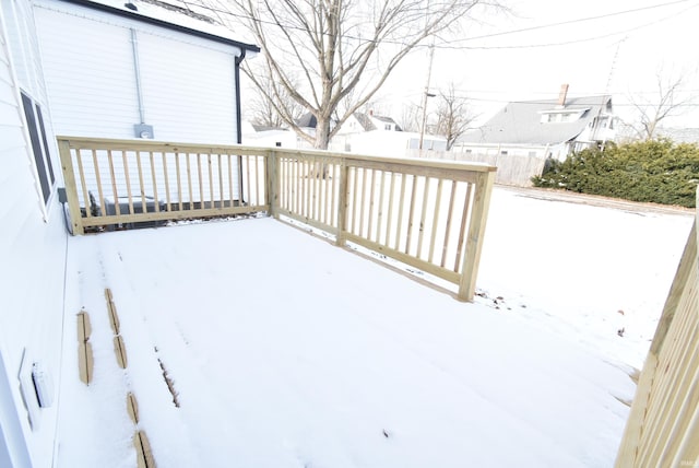 view of snow covered deck