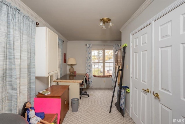 home office featuring crown molding and light carpet