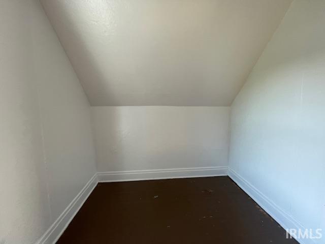 bonus room featuring vaulted ceiling