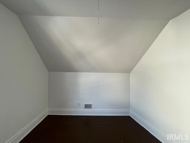 bonus room with vaulted ceiling