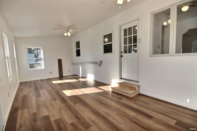 spare room featuring dark hardwood / wood-style floors and ceiling fan