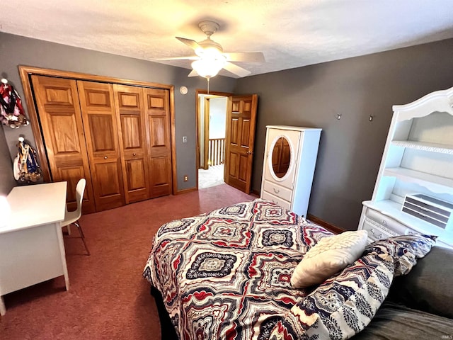 carpeted bedroom with a closet and ceiling fan