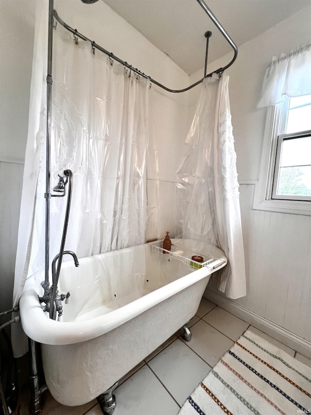 bathroom with tile patterned floors