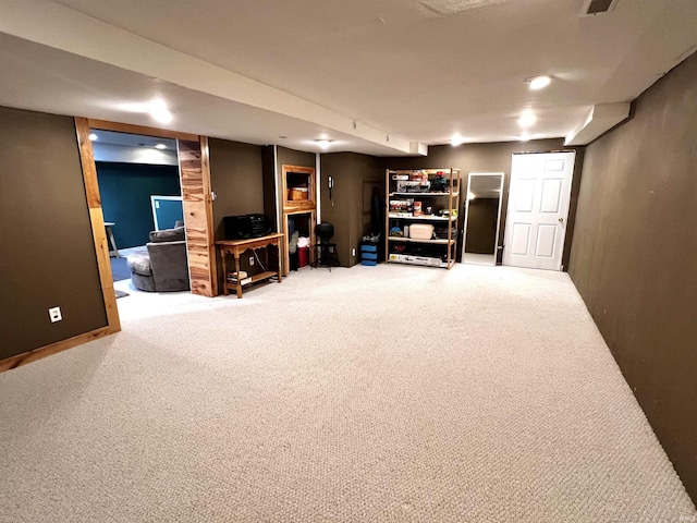 basement with carpet flooring