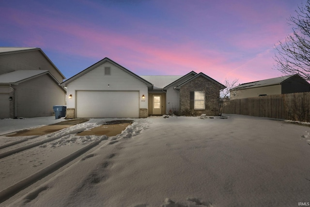 ranch-style house with a garage