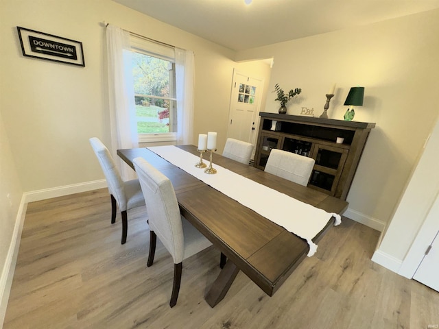 dining room featuring light hardwood / wood-style flooring