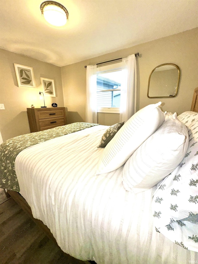 bedroom featuring wood-type flooring