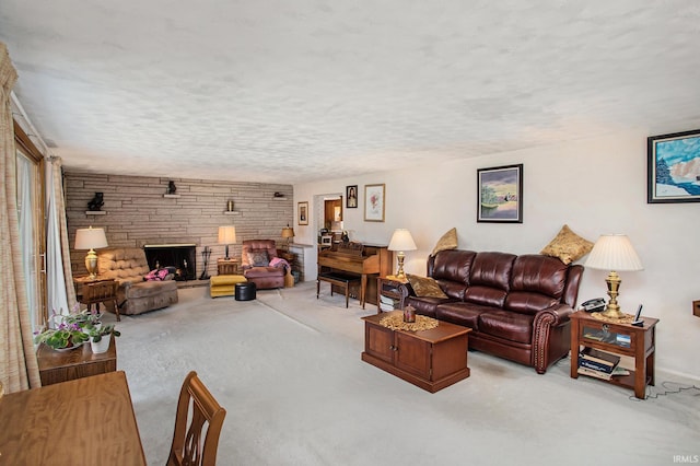 living room with light carpet, a textured ceiling, and a stone fireplace