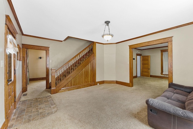 carpeted living room with crown molding