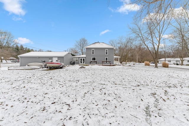 view of snow covered house