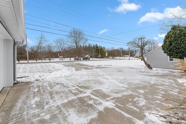 view of yard covered in snow