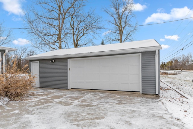 view of snow covered garage