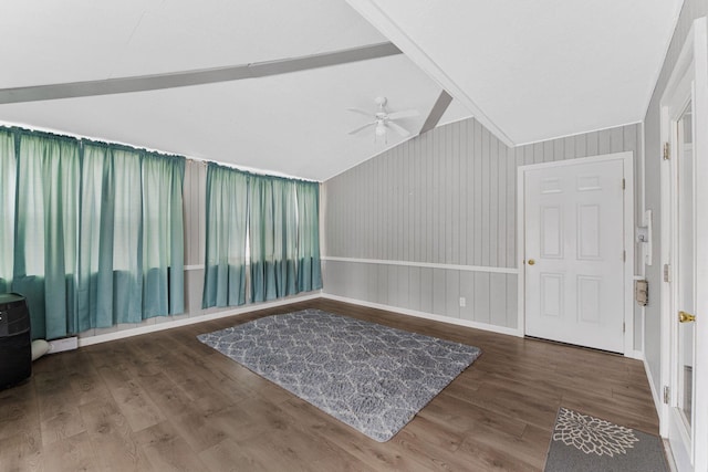 entryway featuring ceiling fan, dark hardwood / wood-style floors, and lofted ceiling