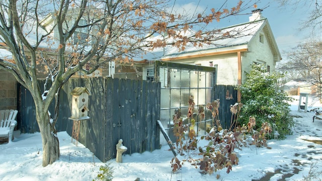 view of snow covered property