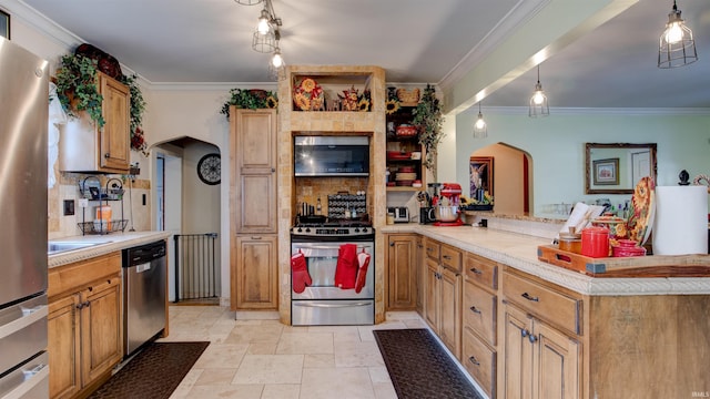 kitchen with pendant lighting, stainless steel appliances, and ornamental molding