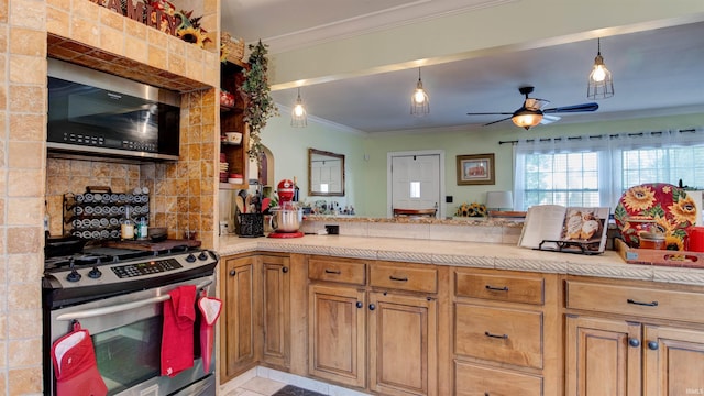 kitchen with tasteful backsplash, kitchen peninsula, pendant lighting, appliances with stainless steel finishes, and ornamental molding