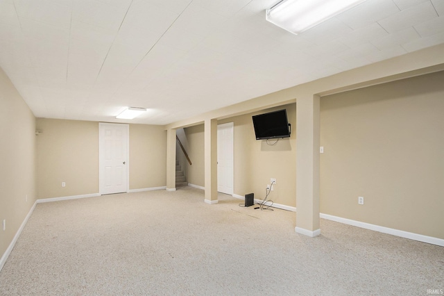 basement with carpet flooring