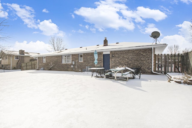 view of snow covered house