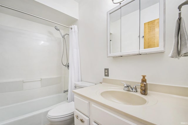 full bathroom featuring vanity, shower / bath combination with curtain, and toilet