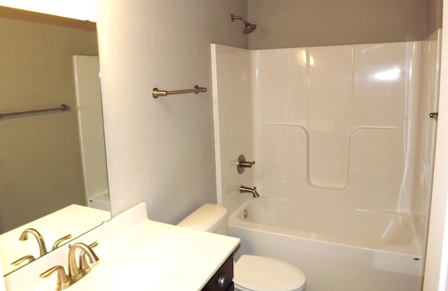 full bathroom with vanity, toilet, and bathtub / shower combination