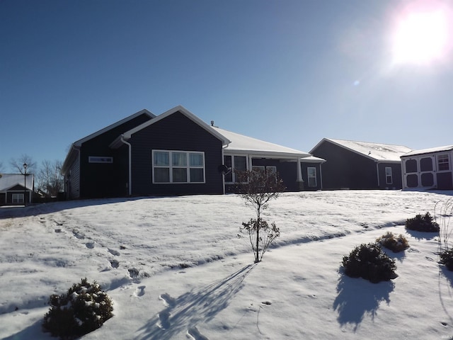 view of snow covered property