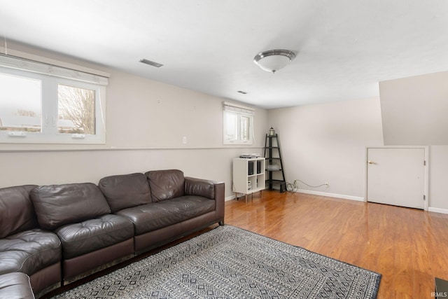 living room with hardwood / wood-style flooring and plenty of natural light