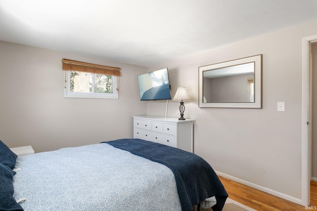 bedroom featuring light wood-type flooring