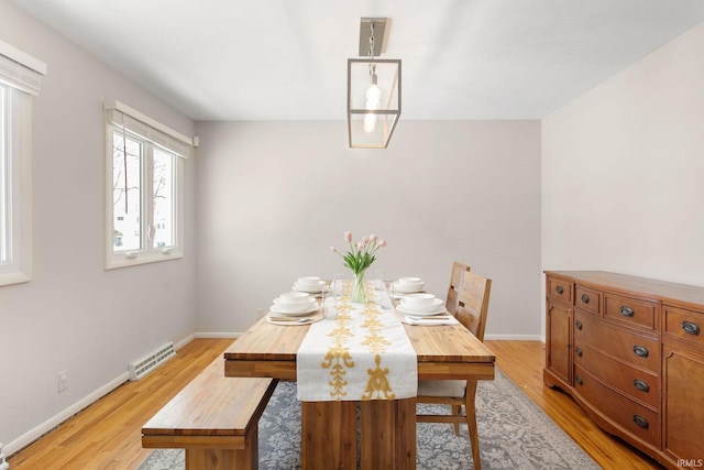 dining room with light wood-type flooring