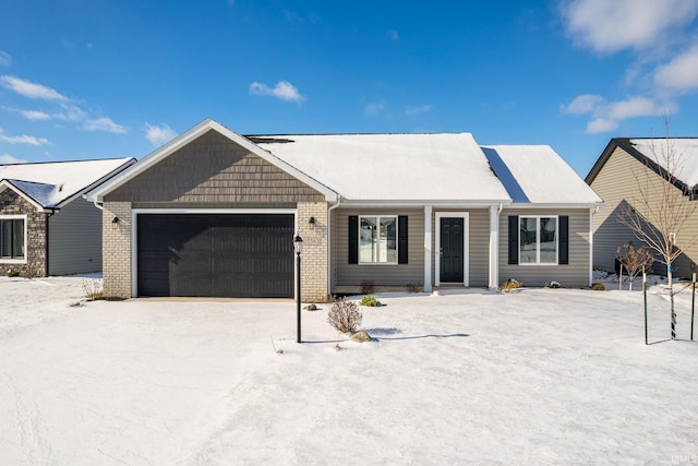 ranch-style house featuring a garage