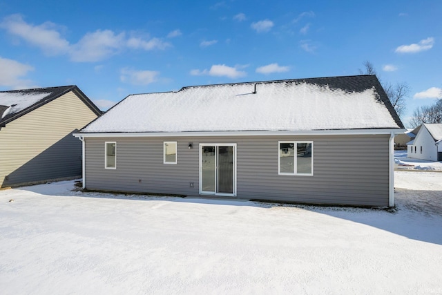 view of snow covered property