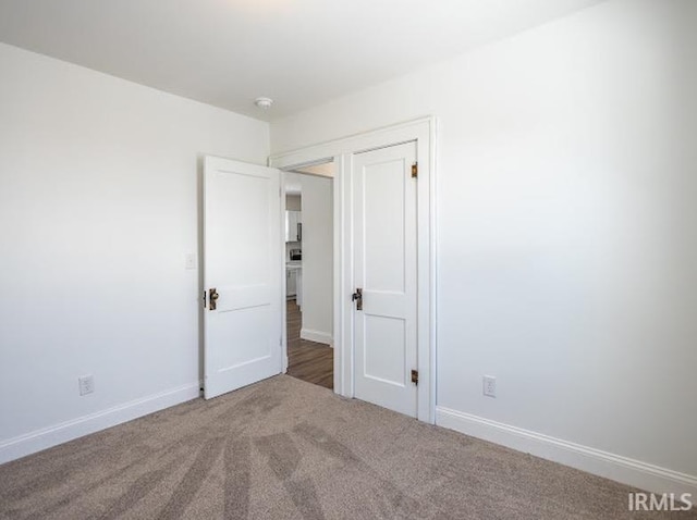 spare room with carpet flooring