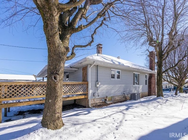 view of snow covered property