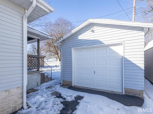 view of snow covered garage