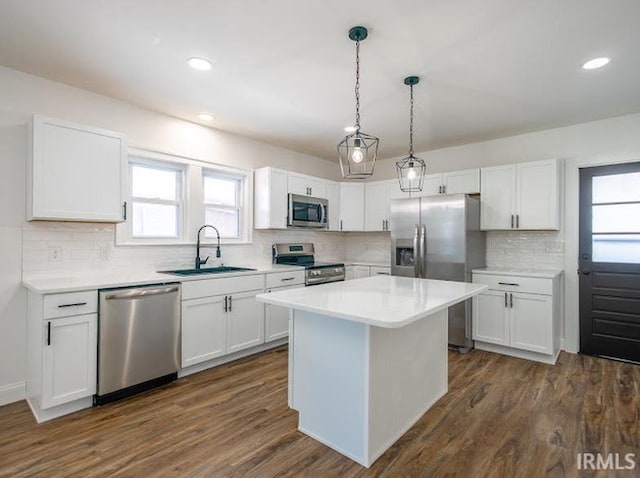 kitchen featuring white cabinets, sink, and stainless steel appliances