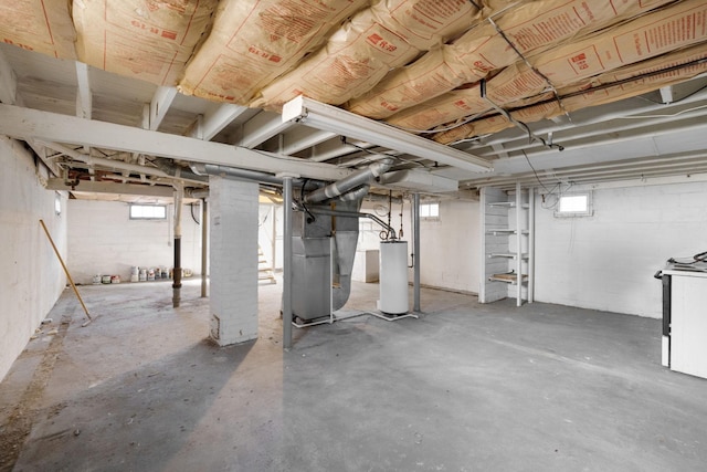 basement with heating unit and water heater