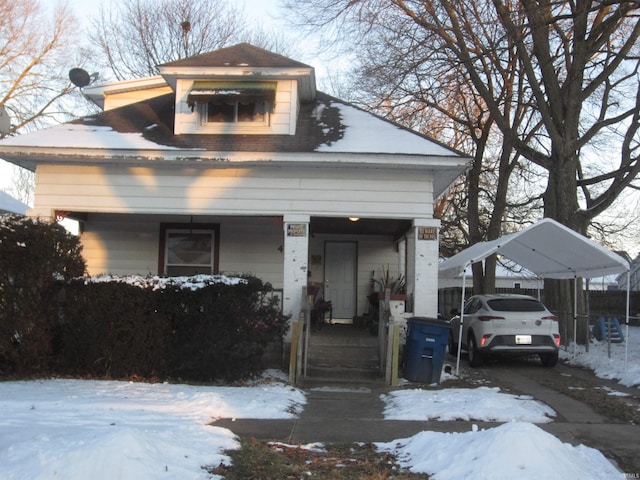 view of front of house featuring a carport