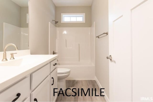 full bathroom featuring shower / tub combination, hardwood / wood-style floors, vanity, and toilet