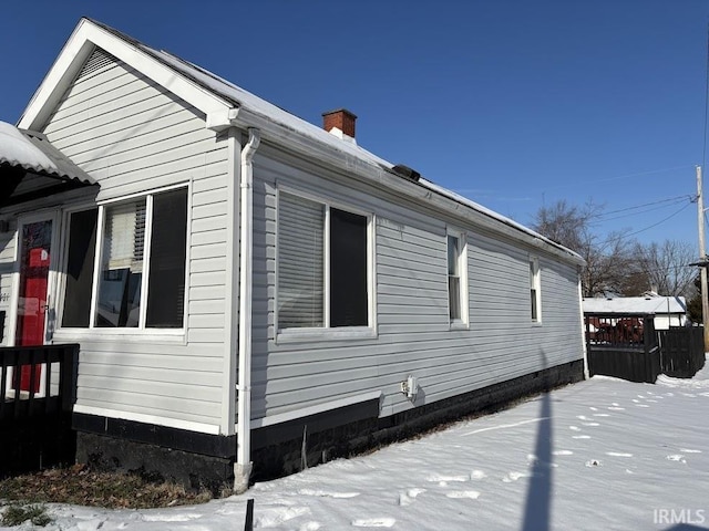 view of snow covered property