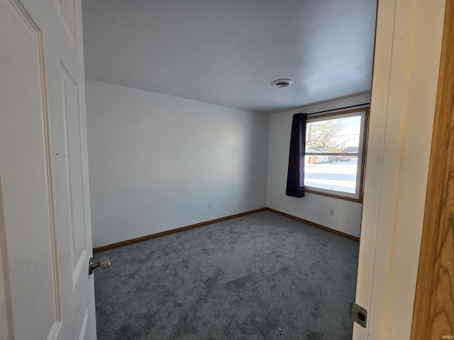 view of carpeted spare room